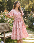 👗🌸 V-neck floral maxi dress with ruffle sleeves and belt